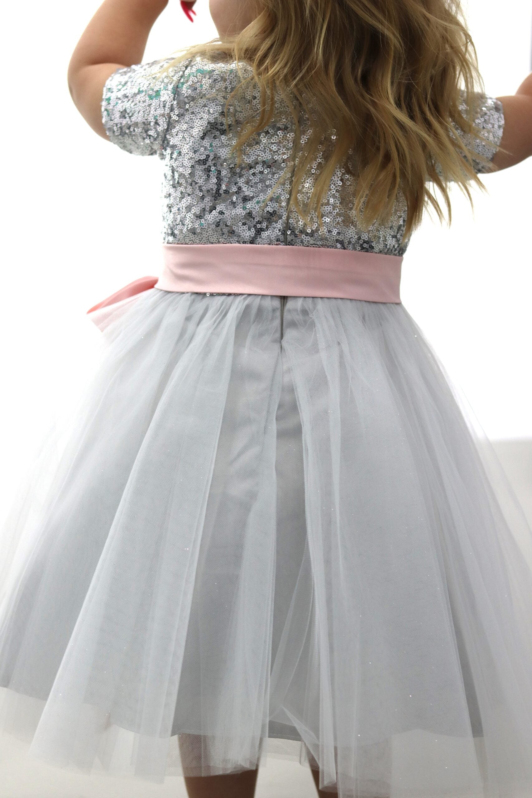 Silver Sequin Knee Length Dress With Pink Belt