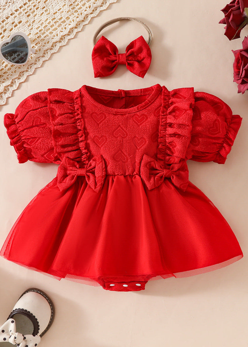 Red baby romper dress with a matching headband